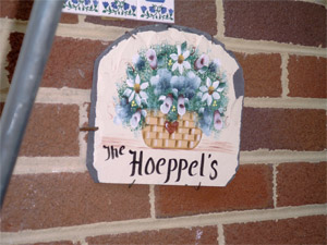 the sign on the front of the palatial estate which proclaims 'Hoeppels'